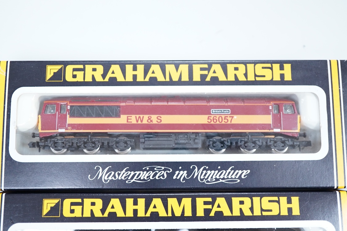 Four boxed Graham Farish N gauge railway class 56 diesel locomotives; a Load Haul, 56055, (805D), an EWS, British Fuels 56057 (805E), a Coal Sector, 56 092, (8057) and a Construction Sector, 56 059 (8056).